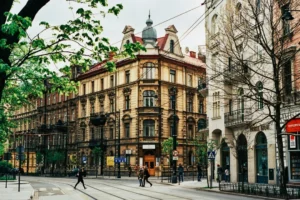 people walking near beige building